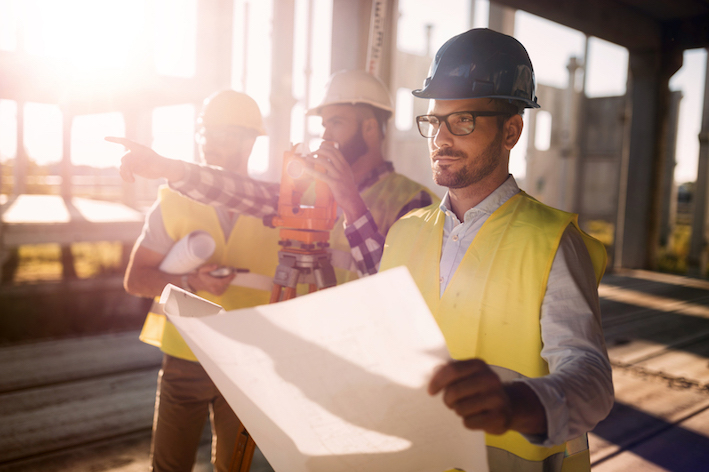 Picture of male construction engineer working on building site